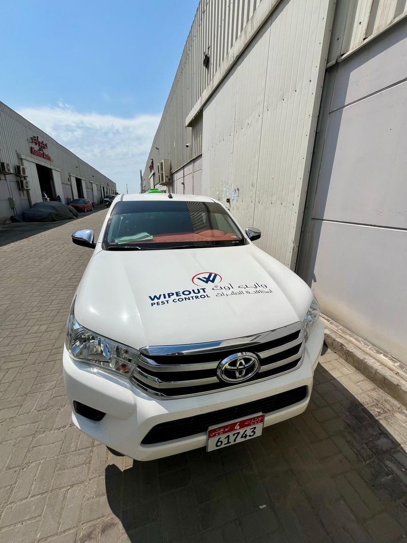 Front view of a Wipeout Pest Control service truck in the UAE